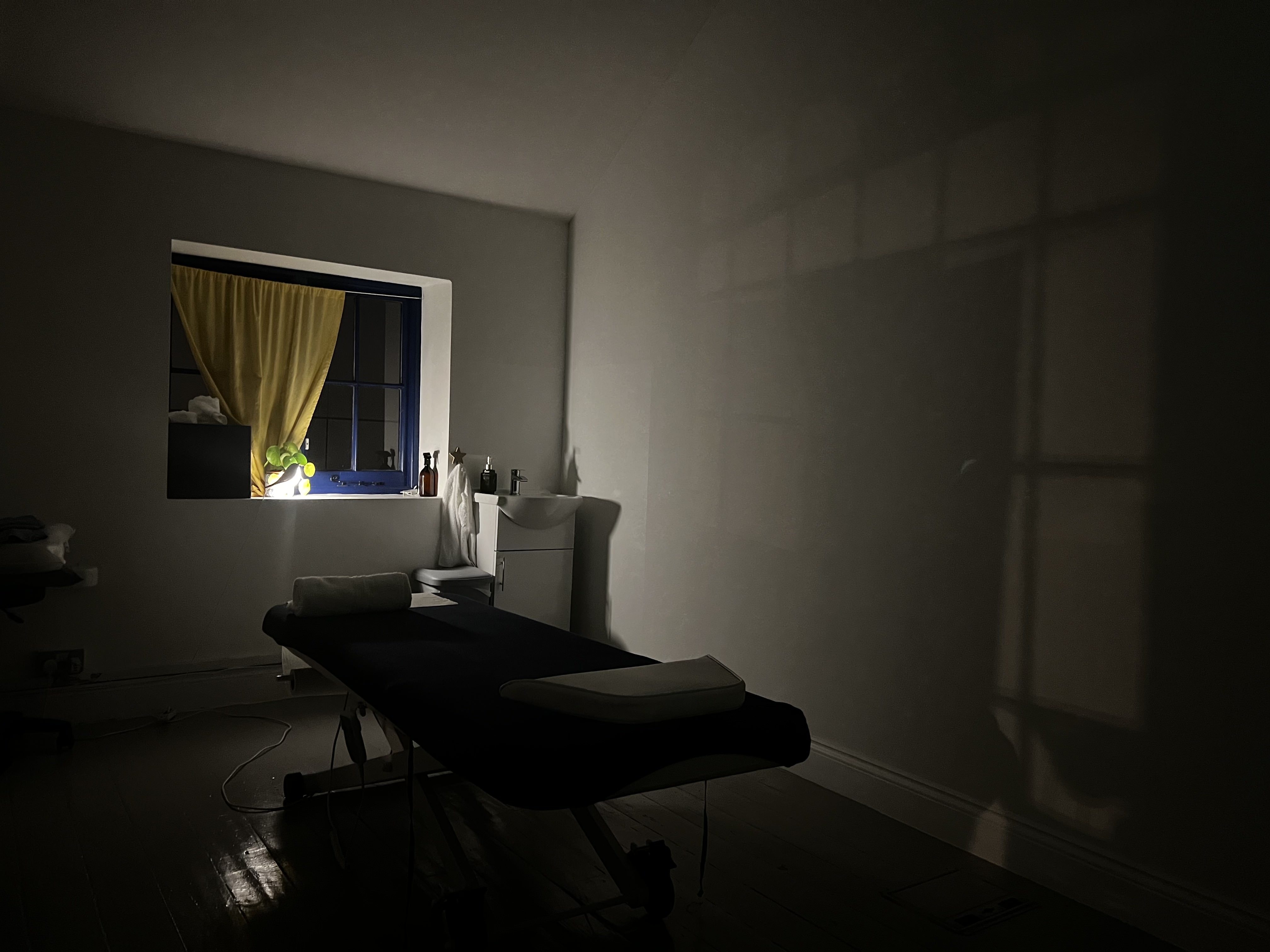 mobile massage table set up in living room